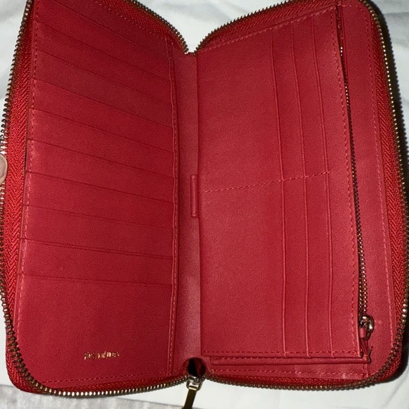 Preloved Yves Saint Laurent red leather long wallet pristine condition zipper. - Picture 6 of 6